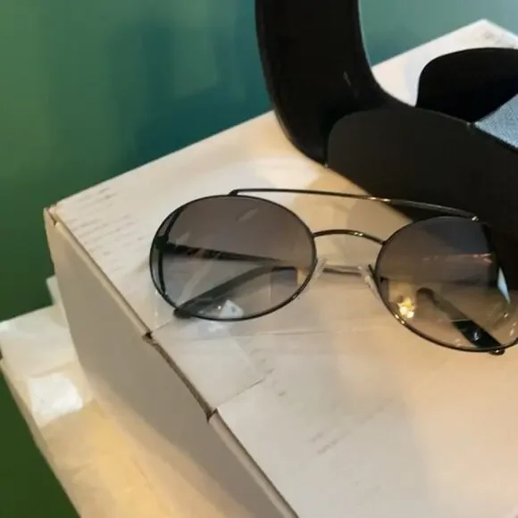 Prada 61mm Oval Sunglasses silver